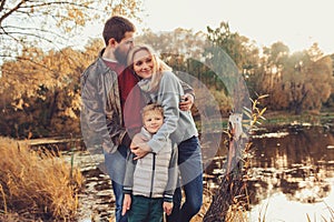 Happy family spending time together outdoor. Lifestyle capture, rural cozy scene