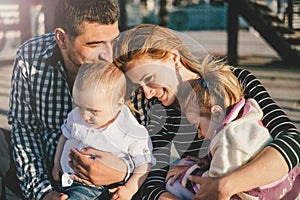 Happy family spending time together outdoors.