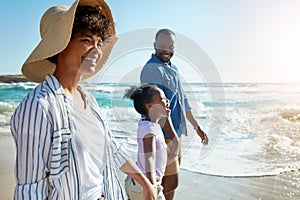 Happy family, summer and beach walk by parents and child on vacation or holiday at the ocean or sea. Travel, mother and