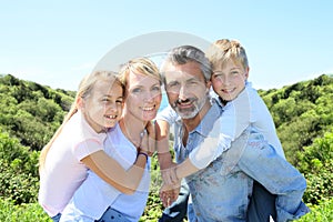 Happy family on summer holidays enjoying