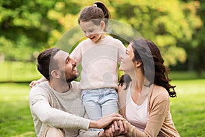 Happy family in summer park