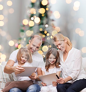 Happy family with tablet pc computers