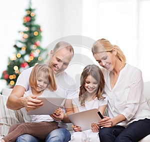 Happy family with tablet pc computers