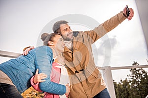 Happy family taking selfie