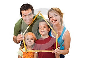 Happy family with their kids - real estate concept