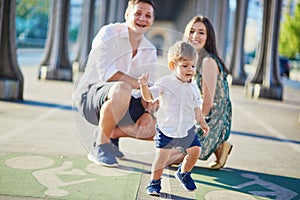 Happy family of three enjoying their vacation in Paris