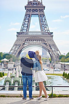 Happy family of three in Paris