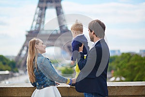 Happy family of three in Paris