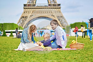 Happy family of three in Paris