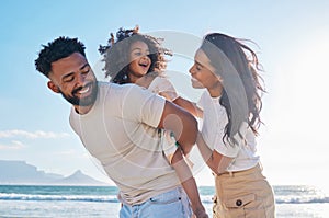 Happy family, travel and parents with a child at the beach excited for a sea or ocean vacation together in happiness