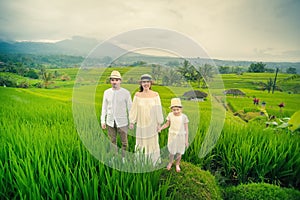 Happy family travelers taking selfie at mobile phone