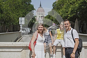 happy family traveling with tired children smiling look at the c