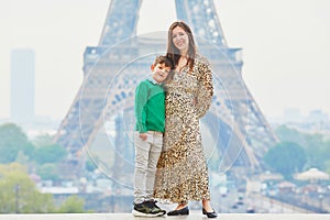 Happy family of two enjoying their trip to Paris, France