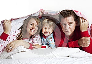 Happy Family under blanket photo