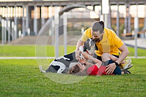 Happy family for a walk with the dog