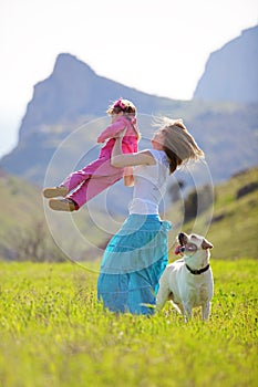 Happy family walking with dog