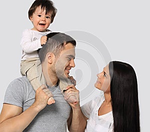 Happy family on a white background. Mother, father and son