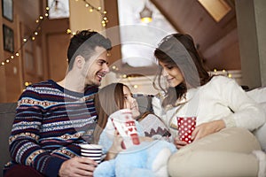 Happy family in winter chalet