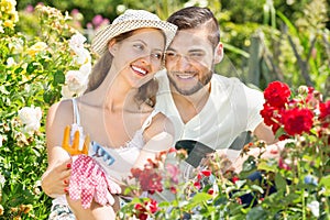 Happy family working in garden