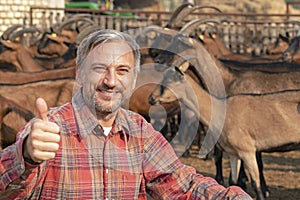 Happy Farmer Giving Thumbs Up at His Organic Goat Dairy Farm