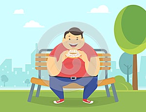 Happy fat man eating a big donut in the park