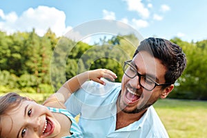 Happy Father And Child Having Fun Playing Outdoors. Family Time