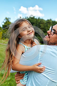 Happy Father And Child Having Fun Playing Outdoors. Family Time