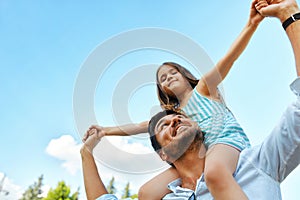 Happy Father And Child Having Fun Playing Outdoors. Family Time