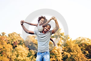 Happy father and child spending time outdoors