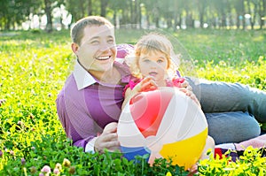 Happy father and daughter on nature