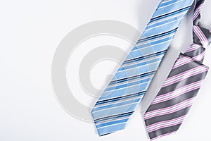 Happy Father Day background concept with blue and pink necktie on white background with copy space for text