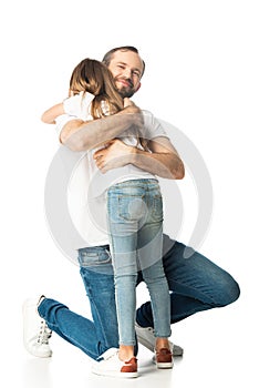 Happy father hugging daughter isolated on