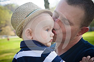 Happy Father Kissing Baby Son
