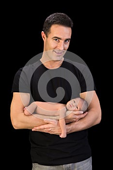 Happy father with newborn baby