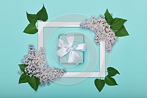 Happy Father`s day or Birthday Pastel Candy Blue Colour Background. Floral flat lay greeting card with picture frame mock up.