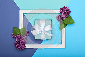 Happy Father`s day or Birthday Pastel Candy Blue Colour Background. Floral flat lay greeting card with picture frame.