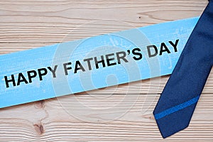 Happy Father`s Day with blue neckties on wooden background.  International Men`s Day concepts