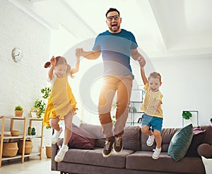 . Happy father`s day! Children congratulates dad a jump and dance