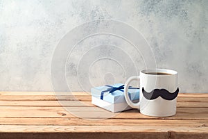 Happy Father`s day concept with coffee mug and gift box