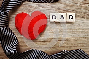 Happy Father`s Day concept with DADDY alphabet letter with space copy on wooden background