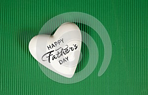 Happy Father\'s day design on heart with green background