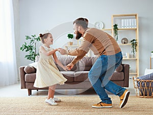 Happy father`s day! family dad and child daughter Princess dancing