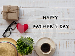 Happy Father`s Day inscription with redheart, gift box, hat, gla