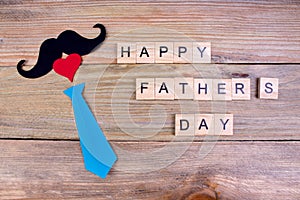 Happy Father`s day on wooden background. symbols of love, father, man. happy Valentine`s day background. copy space for