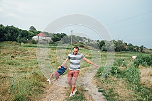 Happy father and son playing together