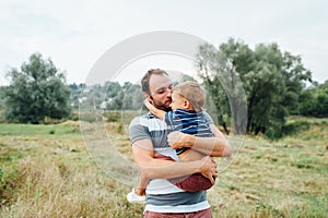 Happy father and son playing together