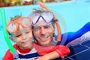 Happy father and son snorkeling making selife