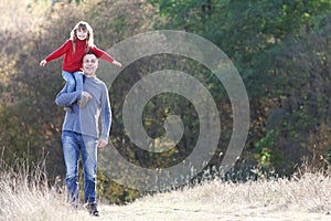 happy father walks with child emotions concept family