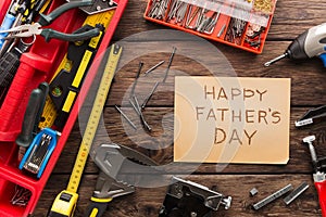 Happy Fathers Day background, card on rustic wood with repair tools