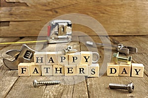 Happy Fathers Day blocks on rustic wood